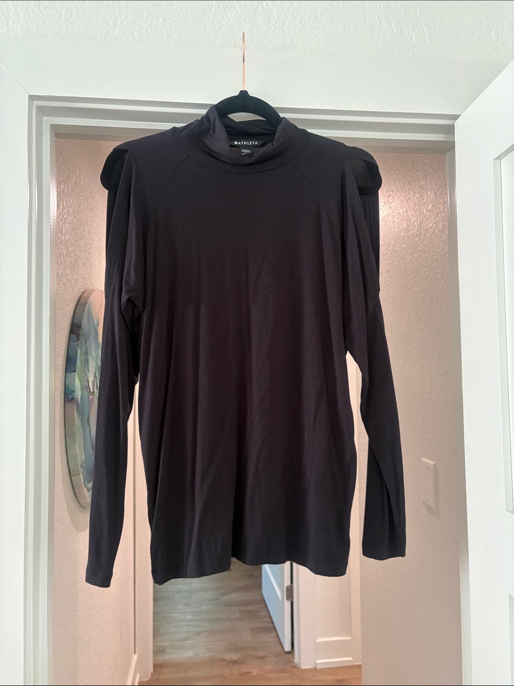Athleta Black Long-Sleeve Mock Neck Top with Subtle Shoulder Detail